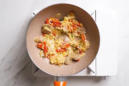 Several hands holding beer glasses