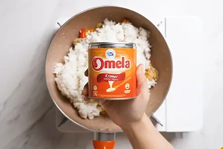 Several hands holding beer glasses