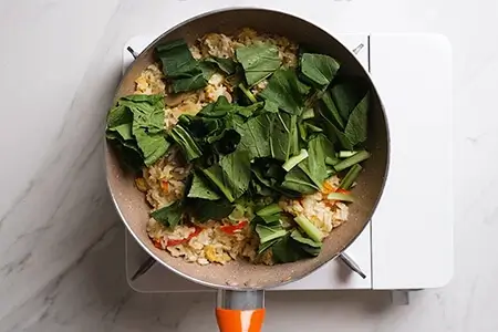 Several hands holding beer glasses
