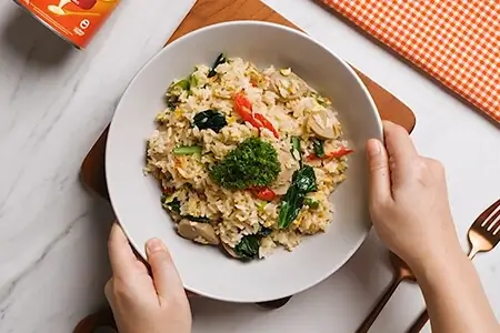 Several hands holding beer glasses